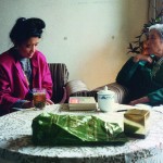 Interviewing Wang Guangmei, widow of former president Liu Shaoqi. On the table in front was the present I brought her: a bottle of Dior perfume from Harrods.