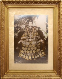 A photographic portrait of Cixi sent to US President Theodore Roosevelt in 1904, thanking him for his good wishes for her seventieth birthday.  Her face has been airbrushed in the photgraph.