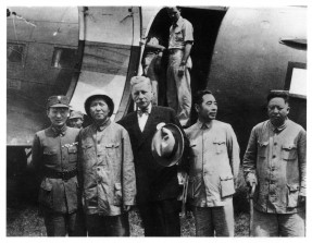 In August 1945 when Japan surrendered, Stalin told Mao to go to Chongqing to play the negotiating game with Chiang Kai-shek.  Mao in topee on arrival at Chongqing, with US Ambassador Patrick Hurley (centre).  Chou Enlai to right of Hurley.