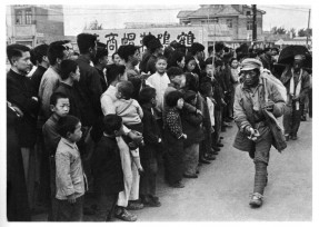 Red troops entering Nanjing to a conspicuously cool welcome.  The Communists later filmed reconstructions of the takeover of cities and showed them as if they were real events.