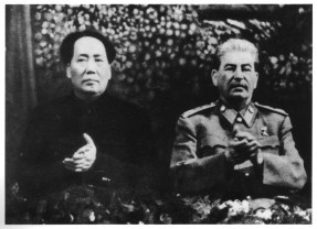 Lookingl grim, next to his patron and rival, Stalin, at the ceremony for Stalin's seventieth birthday, Moscow, December 1949.  To Stalin's left is East German's leader Walter Ulbricht, to whom Mao suggested /building a wall; Mongolia's Tsedenbal far right; Soviet Marshal Bulganin in 9the Centre.  Behind Mao's right shoulder is his interpretor Shi Zhe, who provided us wih much valuable information about Mao's relatiionship with Stalin.