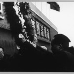 Mao holding up a wreath to Stalin's portrait.  Stalin's death was Mao's moment of liberation.