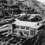 Yenan: the building constructed specially for the Party congress that enthroned Mao in 1945.  Cave dwellings visible in the background, dug into the soft loess hills.