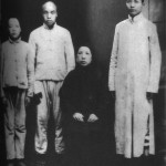 Mao Tse-tung (right), in the only photograph of him with his mother, taken in Changsha in 1919, shortly before she died.  Mao, aged twenty-five, is dressed in scholar's garb, while his two younger brothers, Tse-t'an (far left) and Tse-`min, are still wearing peasant clothes.