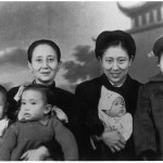 My grandmother holding me (aged two with ribbons in hair) and Jin-ming; my mother holding Xiao-hei, Xiao-hong standing.  Chengdu, late 1954.