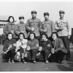 On Tianamen Square, Peking, as a Red Guard (front, second from left), with friends and air force officers (including one woman) assigned to train us.  I am wearing a Red Guard armband, my mother's 'Lenin jacket', and patched trousers to look 'proletarian'.  We are all holding the Little Red Book in a standard posture of the time.  November 1966.