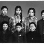 On the eve of being expelled to the edge of the Himalayas (standing second from right); with (standing from left): Jin-ming, Xiao-hong, and Xiao-hei; front row (from left): my grandmother, Xiao-fang, and Aunt Jun-ying; Chengdu, January 1969.  The last photograph of my grandmother.