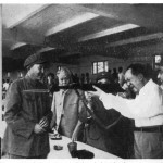 "Power comes out of the barrel of the gun".  Mao at a military exercise, with (from left) Luo Ruiqing and President Liu Shao-ch'i.